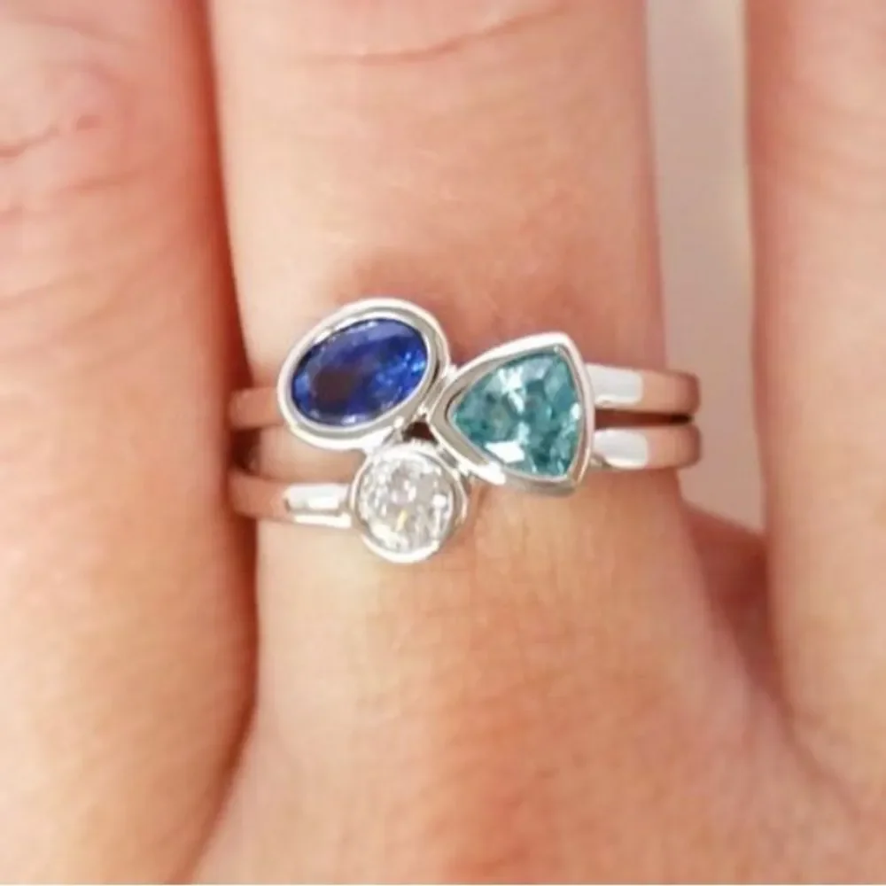 The Shades of blue ring in 925 silver and lab created gem stones sz 5